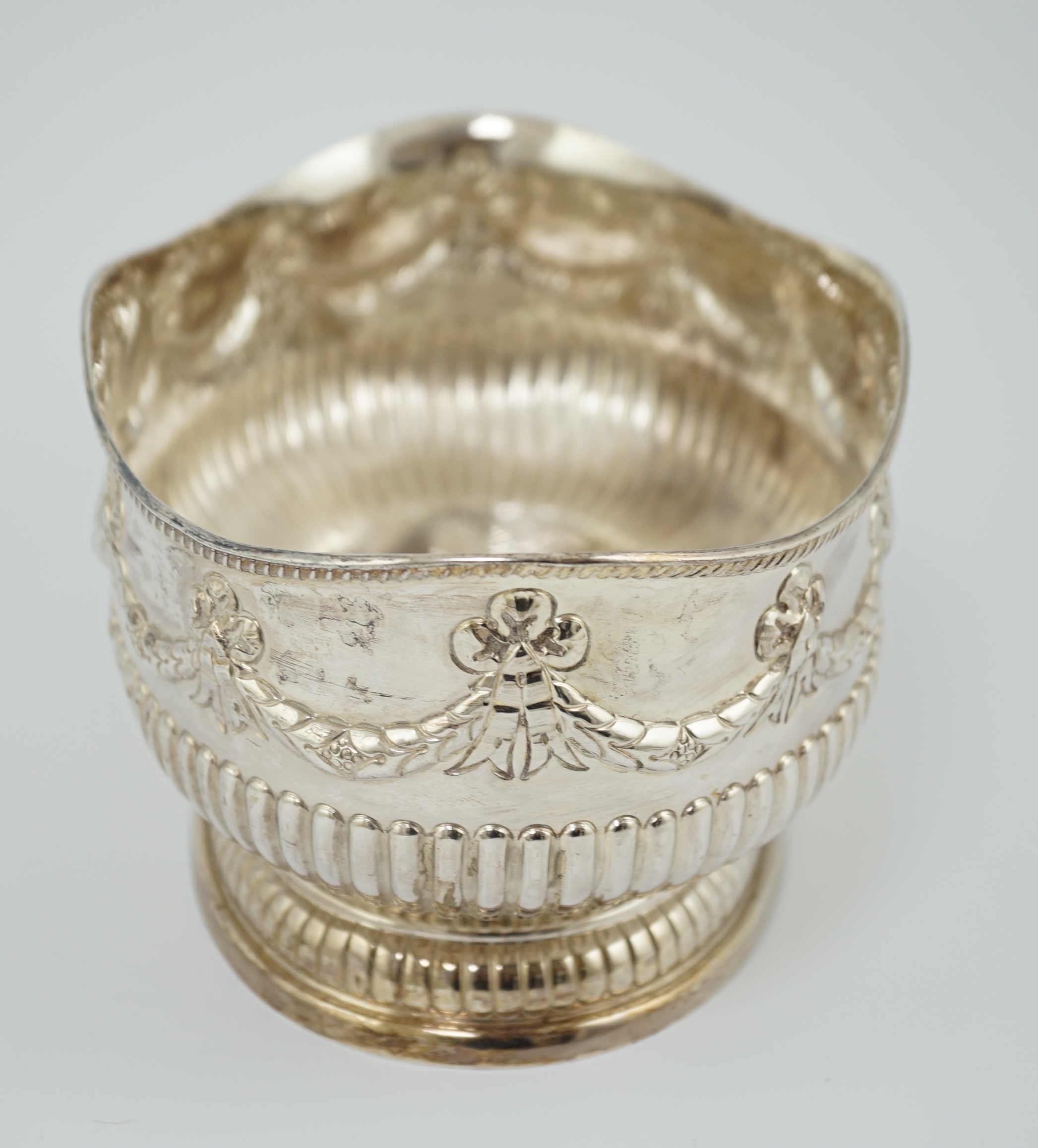 A late Victorian demi-fluted silver oval fruit bowl, by Martin, Hall & Co